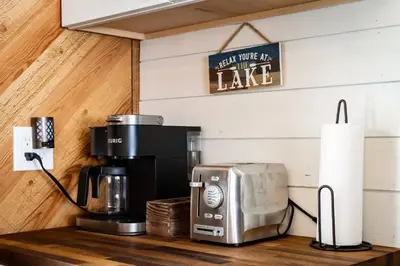 a coffeemaker on a counter with a coffee maker at Whispering Pines Cabin - Family & Pet Friendly Abode in South Lake Tahoe