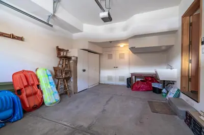 a room with luggage and a sink in a room at RR-Hideaway_Down_Cyn 104 in June Lake