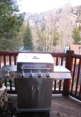 a grill sitting on a deck on a porch at RR-Hideaway_Down_Cyn 104 in June Lake