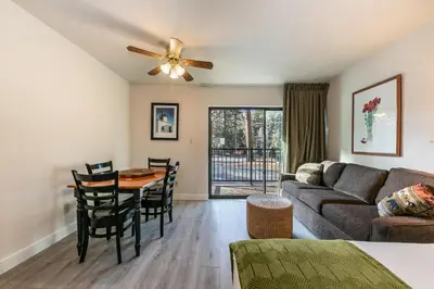 a living room with a couch and a table at 234 Bldg C condo in Truckee