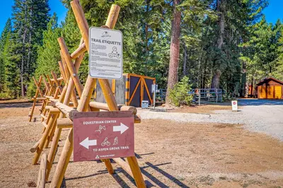 a sign in front of a park with a wooden fence at Chill on the Hill in Truckee