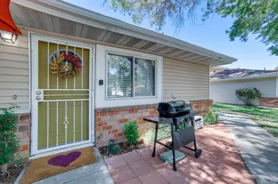 a barbecue grill in front of a house at 1 Mi to Reno-Sparks Family Retreat with Fireplace! in Reno