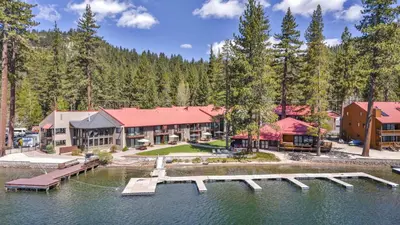 an aerial view of a resort with a dock in the water at 231 Bldg C condo in Truckee