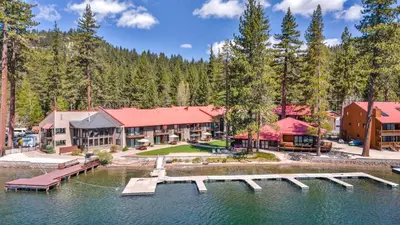 an aerial view of a resort with a dock in the water at 112 Bldg B condo in Truckee
