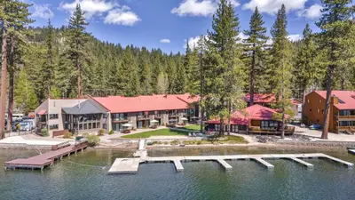 an image of a resort with a dock in the water at 145 Bldg C condo in Truckee