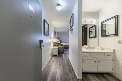 a bathroom with a sink and a mirror at 111 Bldg B condo in Truckee