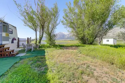 an rv with a picnic table and trees at 11 Mi to Heavenly Mtn Resort Getaway with Mtn Views in Gardnerville