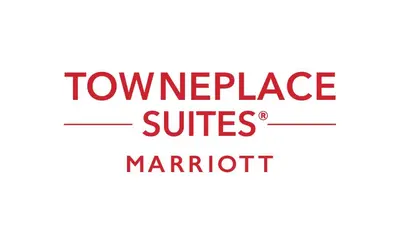a sign with the wordsurance suites maruth at TownePlace Suites by Marriott Tracy in Tracy