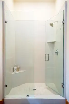 a shower with a glass door in a bathroom at Family Escape Minutes to Northstar EV Charger WandD in Truckee