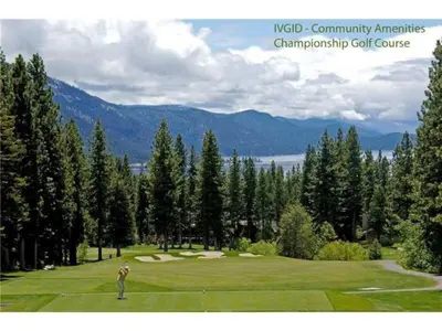 a man is standing on a golf course at Idyllic Incline Village close to Lake Tahoe in Incline Village