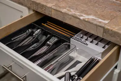 a drawer in a kitchen with utensils in it at MtnCity Views 4BR Firepit FamilyRetreat NearUNR in Reno