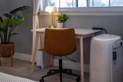 an office with a desk with a chair and a heater at MtnCity Views 4BR Firepit FamilyRetreat NearUNR in Reno