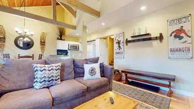 a living room with a couch and a table at Bigwood #30 condo in Mammoth Lakes