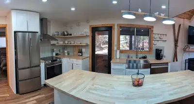 a large kitchen with a wooden counter top at Mountain Haven Near Kirkwood Resort! in Pioneer