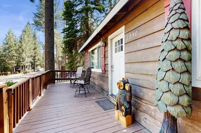 a house with a wooden porch with aocked at The Bear's Den in South Lake Tahoe