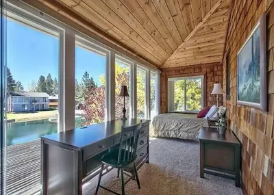 a bedroom with a desk and a bed and a bed and a desk at 2148 Inverness Drive home in South Lake Tahoe