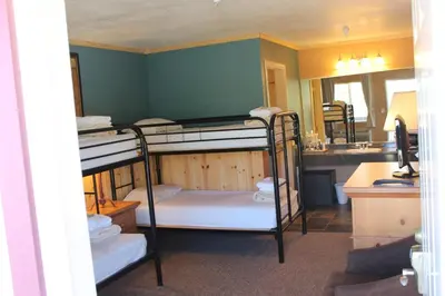a bathroom with two bunk beds in a room at Whitney Portal Hotel And Hostel in Lone Pine