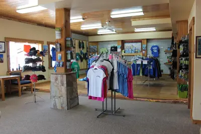 a store with shirts on display in a room at Whitney Portal Hotel And Hostel in Lone Pine
