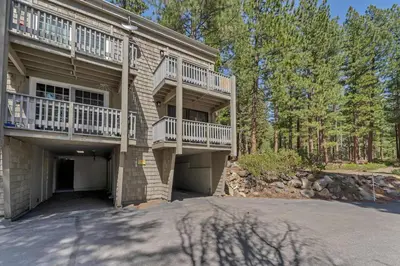 a house with balconies on the side of it at Modern Incline Village Escape Near Lake and Trails in Incline Village