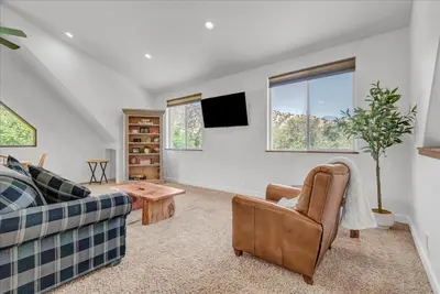 a living room with a couch and a table at New Listing! North Fork Hideaway Sleeps 14! in Three Rivers