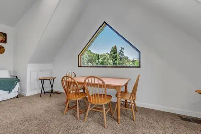 a table and chairs in a room with a window at New Listing! North Fork Hideaway Sleeps 14! in Three Rivers