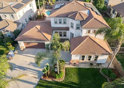 an aerial view of a house with palm trees at Private room--Ideal for working professionals-- in Tulare