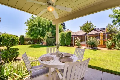 a white table and chairs on a patio at Clovis Family Home Private Pool, Near Old Town! in Clovis