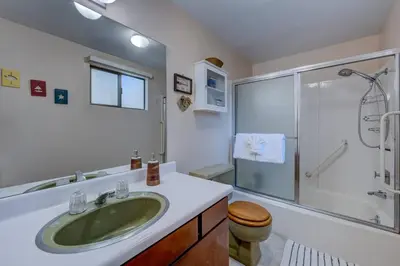 a bathroom with a green sink and a shower at Peak Summer - Relax & Refresh - Charming Kings Beach in Tahoe Vista