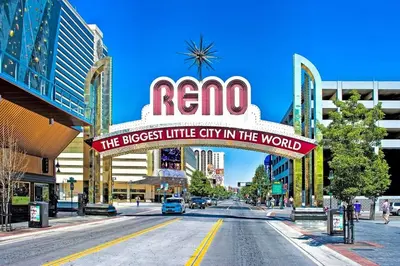 a sign for the neon sign for the regio casino at Special Rates-Skyline Escape-Reno-UNR-Tahoe in Reno