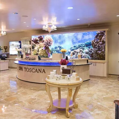 a room with an aquarium with a table in it at Special Rates-Skyline Escape-Reno-UNR-Tahoe in Reno