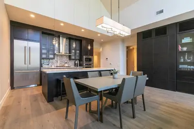 a kitchen with a dining room table and chairs at Crystal Bay Penthouse 301 condo in Crystal Bay