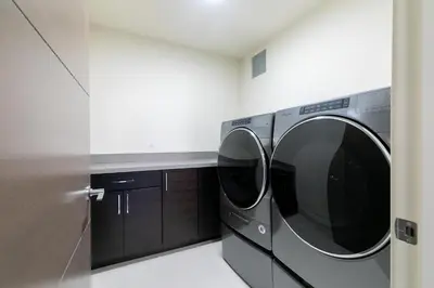 a laundry room with two washing machines in it at Crystal Bay Penthouse 301 condo in Crystal Bay