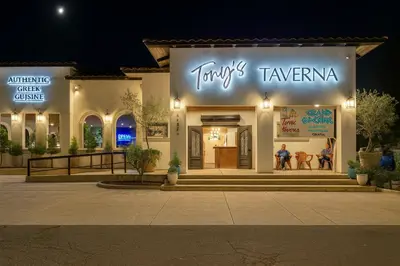 a store front of a shopping center at night at Sequoia Serenity 4 Mi to Sequoia, King Bed in Three Rivers
