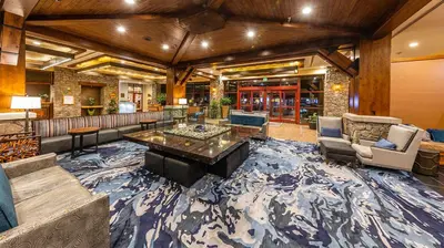 a large living room with a large rug at Marriott Timber Lodge Studio Apartment with Resort Access in South Lake Tahoe