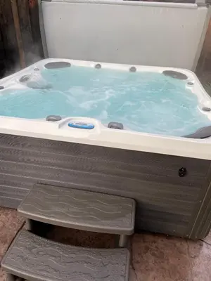 a bath tub with a bird sitting in it at Waterfront Sleeps 6 near Marina with Hot Tub in Discovery Bay