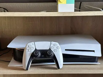 a video game controller sitting on a shelf at Elegant Retreat- Sleep 10-Boho Dome Lounge-Hot Tub-Games-Golf-Serene Getaway in Sacramento