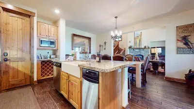 a kitchen with a sink and a counter top at Snowcreek VI The Lodges #1197 condo in Mammoth Lakes