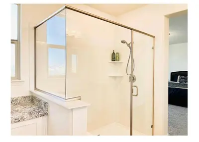 a shower with a glass door in a bathroom at Cozy Private master bedroom in a single family house in Elk Grove