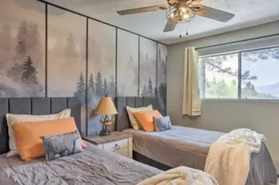 a bedroom with two beds and a ceiling fan at Family Fun-Dogs ok-Bass lake-Yosemite-Sleeps 8 in Oakhurst