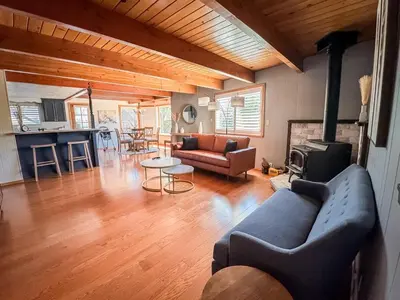 a living room with a couch and a table at On Golf Course, Family&Pet Friendly Yosemite Basecamp in Groveland