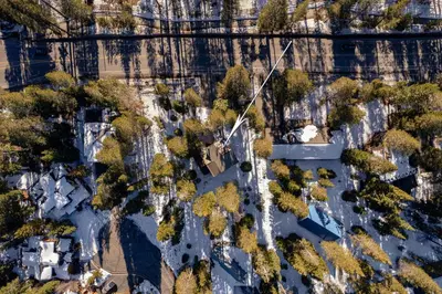 an overhead view of a park with trees and buildings at Front and Center at Palisades by Tahoe Getaways - 3BR, Walk to Palisades! in Olympic Valley