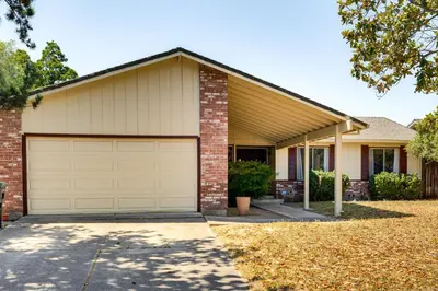 a house with a garage at Updated Home in Suburbs - 10 Mi to Dtwn Stockton! in Stockton