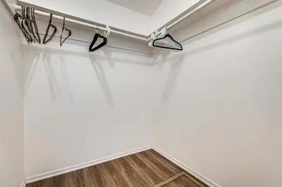 a room with a white wall with a row of glasses at Updated Home in Suburbs - 10 Mi to Dtwn Stockton! in Stockton