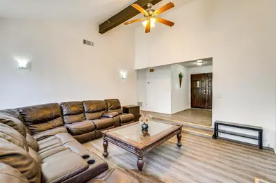 a living room with a couch and a coffee table at Updated Home in Suburbs - 10 Mi to Dtwn Stockton! in Stockton