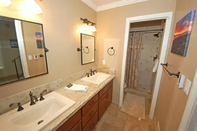 a bathroom with two sinks and a shower at 2078 Traverse Court home in South Lake Tahoe