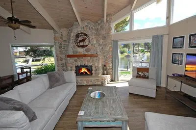 a living room with a couch and a fireplace at 2078 Traverse Court home in South Lake Tahoe