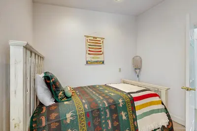 a bedroom with a bed with a colorful blanket at Incline Village Retreat in Incline Village