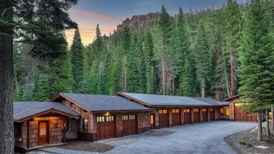 a home in the mountains with a driveway at Big Chief River Retreat-Located on Truckee River in Truckee