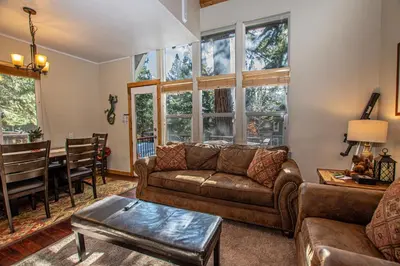a living room with a couch and a table at Dollar Hill II # 61 By Hauserman Rentals in Tahoe City