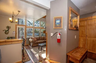 a living room with a fire extinguisher on the wall at Dollar Hill II # 61 By Hauserman Rentals in Tahoe City